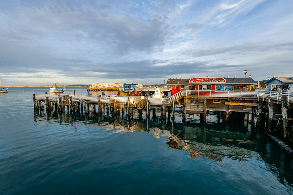 a pier with colorful buildings